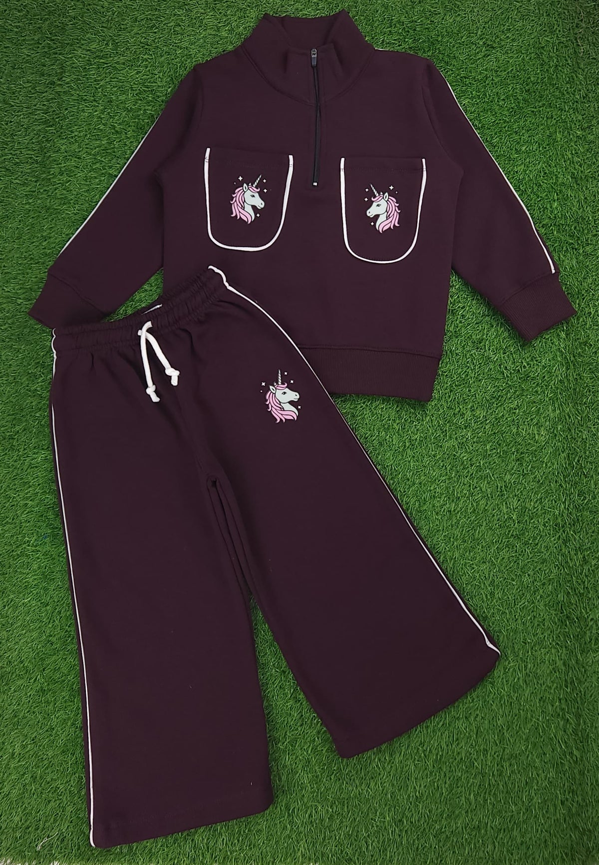 Girls mockneck sweatshirt paired with flapper trouser